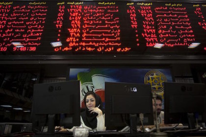 &copy;&nbsp;EDITORS' NOTE:  Reuters and other foreign media are subject to Iranian restrictions on their ability to film or take pictures in Tehran.

An Iranian official works at her desk in the main hall of the Tehran Stock Exchange August 3, 2010. Sanctions against Iran have done nothing to dent a boom in its stock market, as investors bet on a continued rise in company stocks which have been undervalued for years, the head of the Tehran bourse said.    REUTERS/Morteza Nikoubazl (IRAN - Tags: BUSINESS POLITICS)